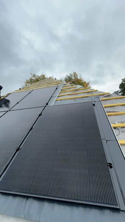 Solar panel installation progress showing electrical connections