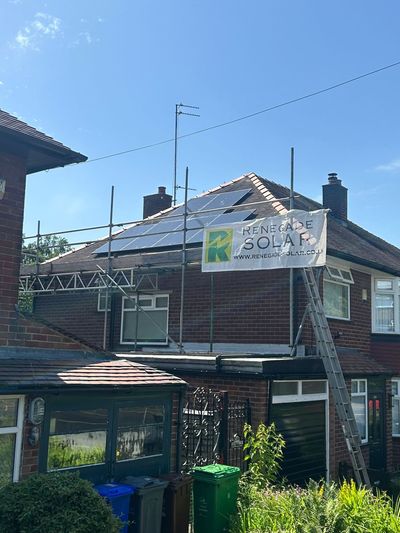 Solar panels on a tiled residential roof during an installation by Manchester installer Renegade Solar