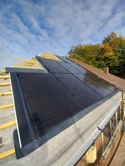 Ongoing solar panel installation showing mounting system